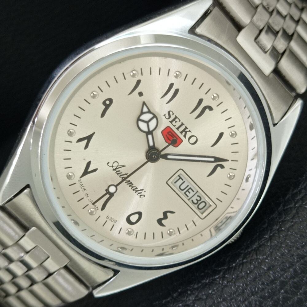 Vintage 1970 Seiko Automatic Mens Silver Watch W/daydate & Black accents